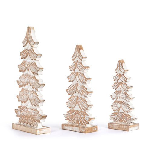 A set of three whitewashed flocked wood carved trees in various sizes, displayed angled to the left.