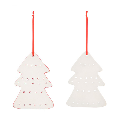Back view of a set of two tree shaped ceramic ornaments, one red and one white. The ornaments have decorative markings and holes.