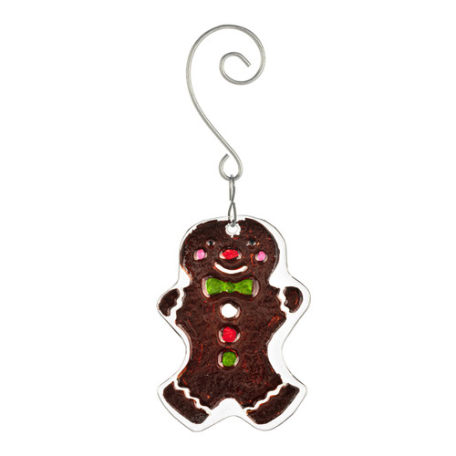 Back view of a glass ornament of a traditional decorated gingerbread man cookie with a curved silver hanger.