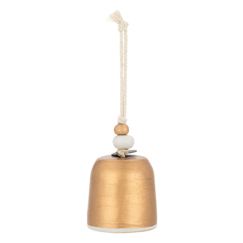 Back view of a mini gold bell with a white dove on the front. There are beads and a metal token at the top of the bell.