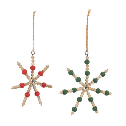 A set of two different wood bead snowflake ornaments. One is made from red and brown and the other is green and brown, displayed angled to the right.