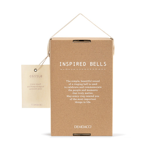 Back view of the packaging box for a gold and white decorative bell with a star hanging from the clapper and beads at the top.