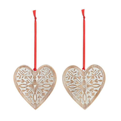 A set of two heart shaped decorative wood ornaments designed for one to keep and one to give away.