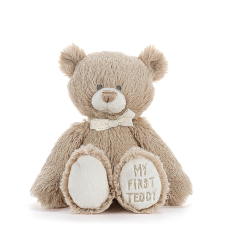 A mini brown plush bear with "My First Teddy" embroidered on the paw of his left leg.