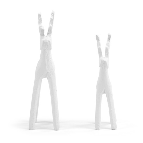 Front view of a set of two cast iron white deer in different sizes.