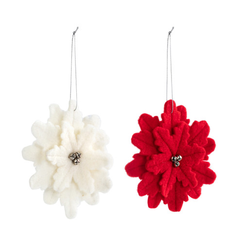 Two felt poinsettia ornaments, one in red and the other white. Each has three mini silver bells in the center, displayed angled to the right.