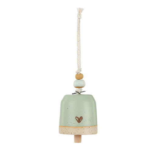 Back view showing the heart on a mini tan and green bell with an image of Pooh and Piglet walking together. There are beads and a metal token at the top of the bell.