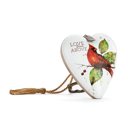 Heart shaped sculpture with a gold tassel and metal key attached. The heart is white with a red cardinal perched on a branch and says "Love from Above", displayed angled to the right.