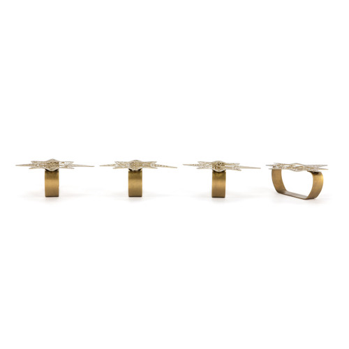 Side view showing the depth of the ring on four different star of Bethlehem shaped napkin rings with various nativity scenes in the star shape.