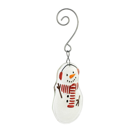 A glass ornament of a snowman wearing a red and white striped scarf and earmuffs with a curved silver hanger, displayed angled to the right.