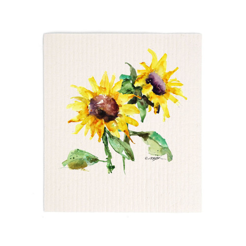 A white biodegradable dish cloth with a watercolor image of yellow sunflowers.