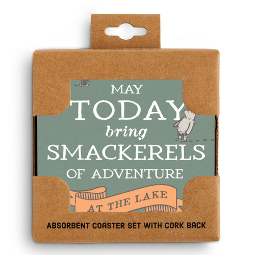 A set of four green square ceramic coasters that say "May Today bring Smackerels of Adventure at the lake", with small images of Pooh and Piglet, displayed in a packaging box.