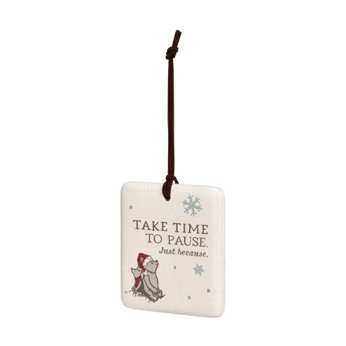 A square cream hanging tile magnet ornament that says "Take Time to Pause. Just Because", with an image of Pooh and Piglet at the bottom, displayed angled to the left.