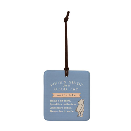 A square blue hanging tile magnet ornament that says "Pooh's Guide for a Good Day on the lake" with an image of Pooh.