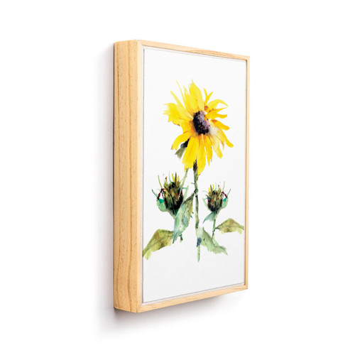 A light wood framed wall art of a watercolor yellow sunflower, displayed angled to the right.