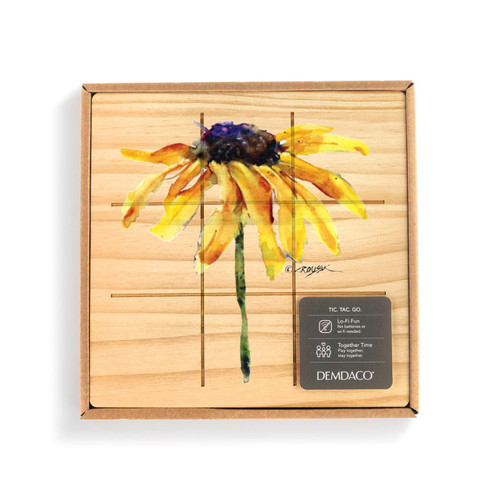A square wood board for tic tac toe with a watercolor image of a black eyed susan, displayed in a packaging box.
