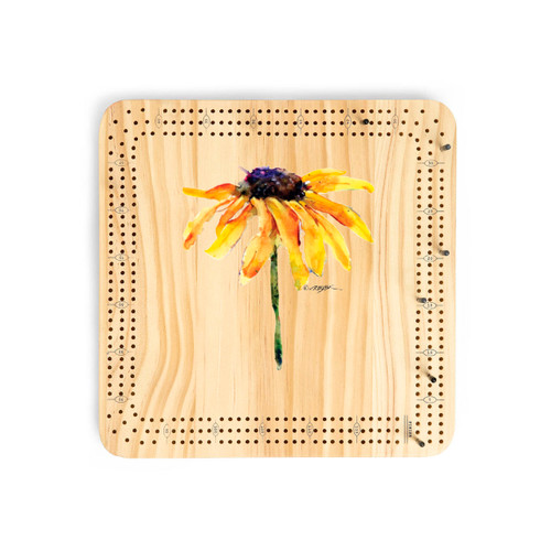 A light wood cribbage board game with the watercolor image of a black eyed susan in the middle.