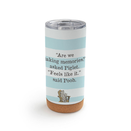 A white and light blue striped cork bottom tumbler with a clear plastic lid. There is an image of Pooh characters sitting in a chair and it says "Are we making memories?" asked Piglet. "Feels like it." said Pooh.