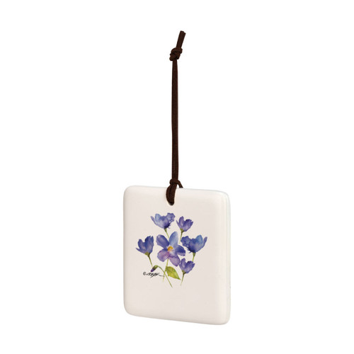 A square cream hanging tile magnet ornament with a watercolor image of a purple violet, displayed angled to the left.