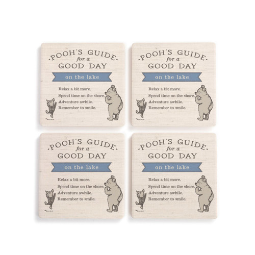 A set of four cream square ceramic coasters that say "Pooh's Guide for a Good Day on the lake" with an image of Pooh and Piglet.