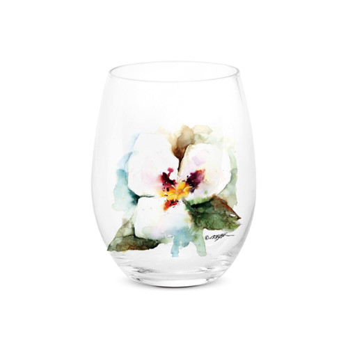 A clear stemless wine glass with a watercolor image of a sego lily.