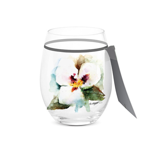 A clear stemless wine glass with a watercolor image of a sego lily, displayed with a product tag attached.