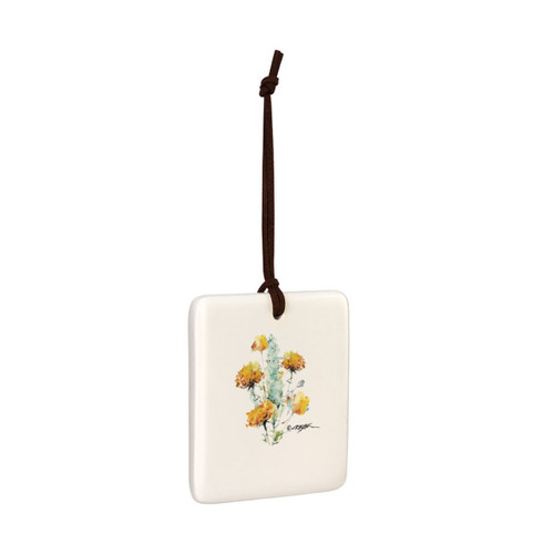 A square cream hanging tile magnet ornament with a watercolor image of a sagebrush, displayed angled to the right.