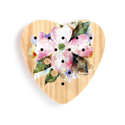A wood heart shaped peg game with a watercolor image of an American dogwood, displayed with two pegs in the game.