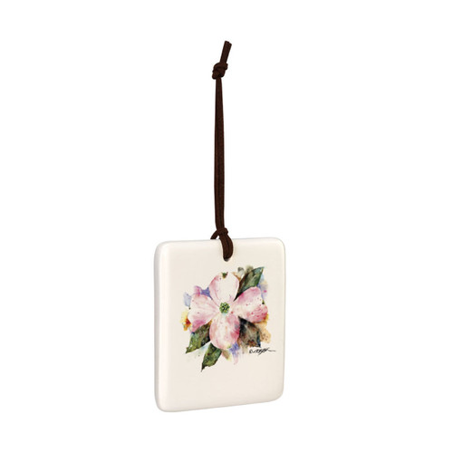 A square cream hanging tile magnet ornament with a watercolor image of an American dogwood, displayed angled to the right.