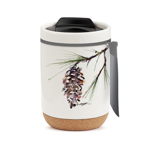 A white travel mug with a cork base, a black lid, and a watercolor image of a white pine branch, displayed with a product tag attached.