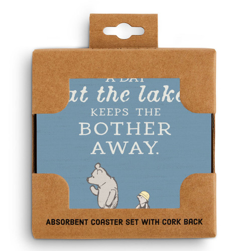 A set of four blue square ceramic coasters that say "A Day at the lake Keeps the Bother Away" with an image of Pooh and Piglet, displayed in a packaging box.