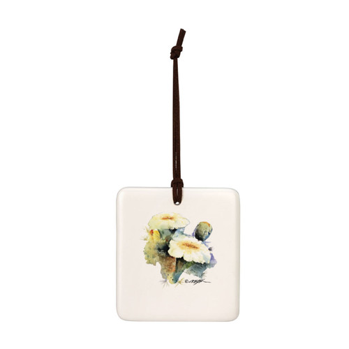 A square cream hanging tile magnet ornament with a watercolor image of a flowering saguaro cactus.