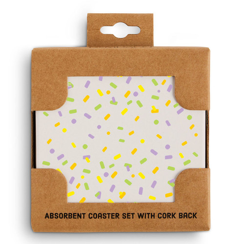 A set of four square ceramic coasters with a colorful confetti pattern, displayed in a packaging box.