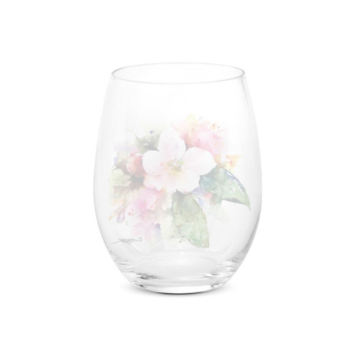 Back view of a clear stemless wine glass with a watercolor image of an apple blossom.