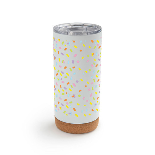 A white cork bottom tumbler with a clear plastic lid. The tumbler is covered in a bright colored confetti image.