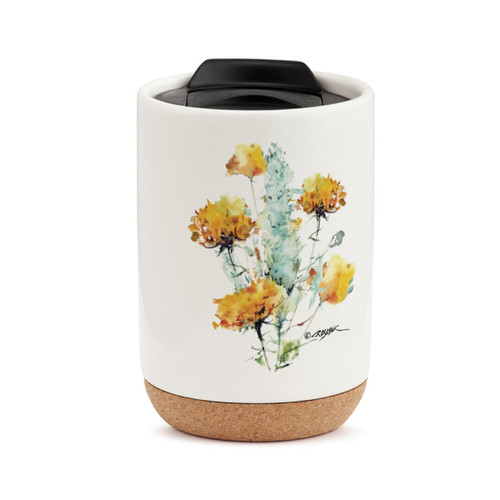 A white travel mug with a cork base, a black lid, and a watercolor image of a sagebrush.