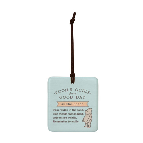 A square light blue hanging tile magnet ornament that says "Pooh's Guide for a Good Day at the beach", with an image of Pooh at the bottom.