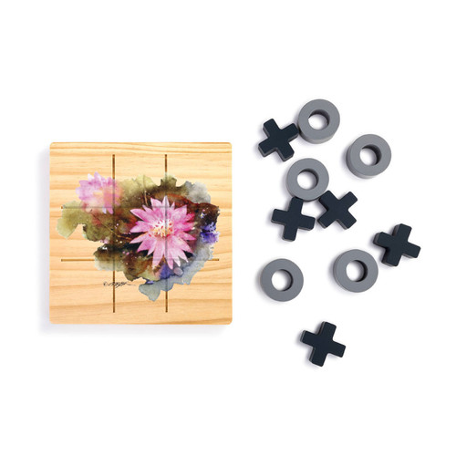 A square wood board for tic tac toe with a watercolor image of a bitterroot, displayed next to a set of X's and O's in gray and black.