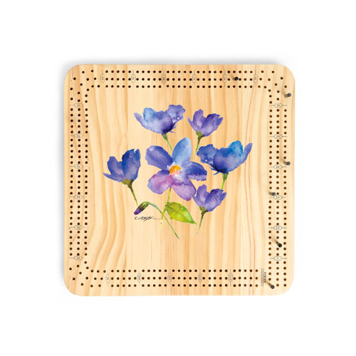 A light wood cribbage board game with the watercolor image of violets in the middle.