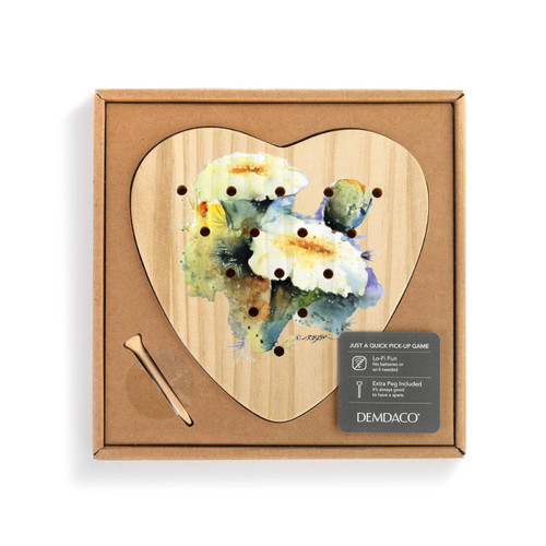 A wood heart shaped peg game with a watercolor image of a flowering saguaro cactus, displayed in a packaging box.