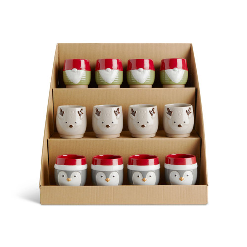 A three tier cardboard displayer with an assortment of three different holiday ceramic candles.