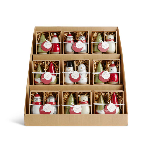 A three tier cardboard displayer with an assortment of Christmas themed salt and pepper sets displayed in packaging boxes.