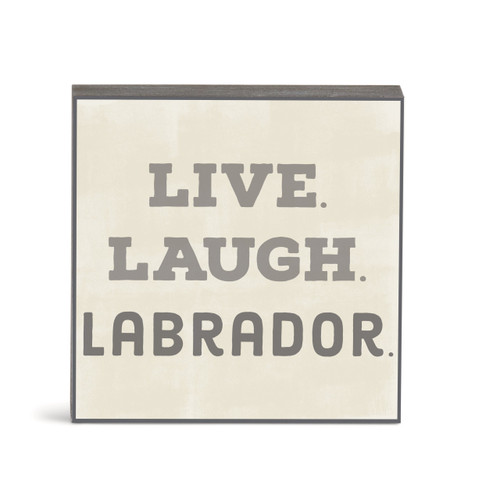 A small square cream wall art with the saying "Live Laugh Labrador".