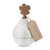 A textured white circular vase with "Just Because" engraved. With a twine rope holding a brown cardboard tag, and a cardboard flower inside the vase.