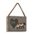 A brown rectangular wood hanging frame with a 2 inch heart shaped opening for a photo next to a bear silhouette that says "Mama" angled to the right.
