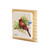 A square wood plaque angled to the left with a tile attached that has a watercolor image of a cardinal on a branch.