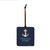 A square hanging ornament with a white anchor that says "Paradise Found" on a dark blue background.