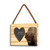 A rectangular wood hanging ornament with a heart shaped 2 inch photo opening next to an image of a bison, displayed angled to the left.