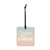 A square tile hanging ornament with sunset colors and says "Chase the Sunburn".