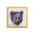 A square wood plaque with a tile attached that has a watercolor image of a bears face.